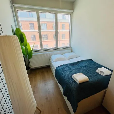 Double Bed And Kitchen